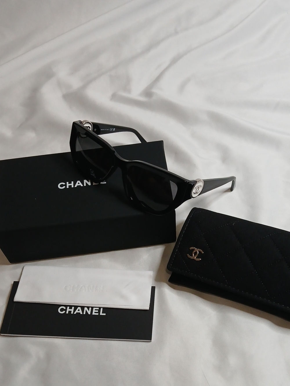 CHANEL Black Cat-Eye Sunglasses with White/Silver CC Emblem